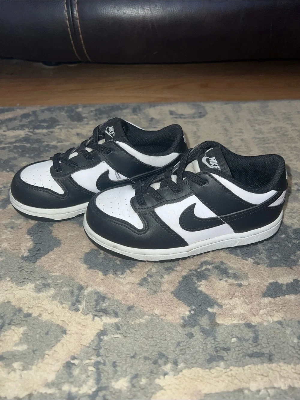 Nike Kids Black and White Low-Top Sneakers with Swoosh